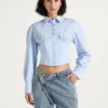 Powder Blue Torvexiatee Vynzora Cropped Button Down Shirt with Ruched Bust and Fitted Waist 1 Powder Blue Torvexiatee Vynzora Cropped Button Down Shirt with Ruched Bust and Fitted Waist 1